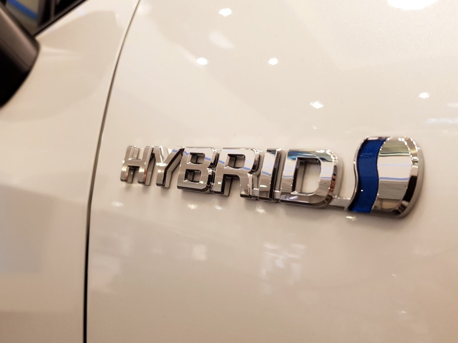 car-hybrid-logo-on-the-side-of-car-sustainability-eco-ecological-environment